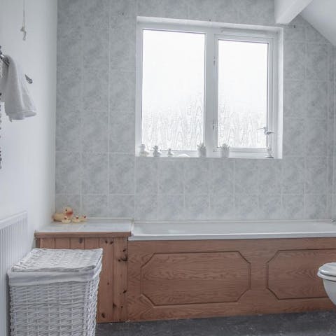 Unwind in the bathtub following an active day surrounded by nature