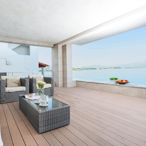 Pour a glass of wine to sip while admiring the spectacular ocean views