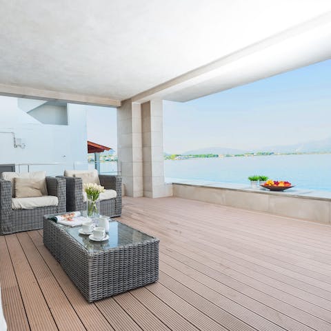 Pour a glass of wine to sip while admiring the spectacular ocean views