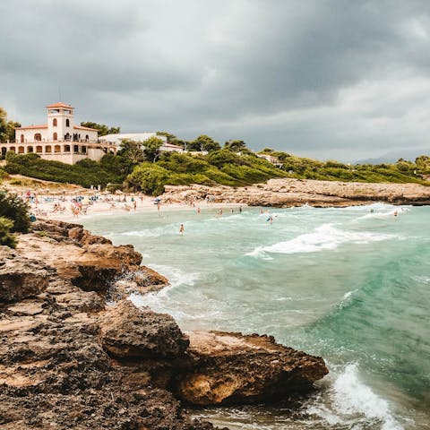 Visit the historic town of Alcúdia and its beach, ten minutes away by car