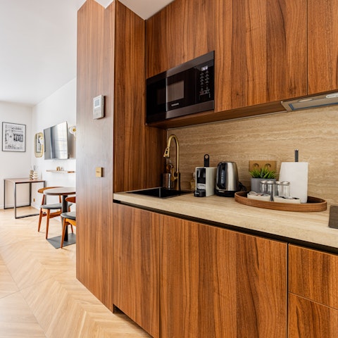 Prepare meals in the sleek and surprisingly spacious kitchen