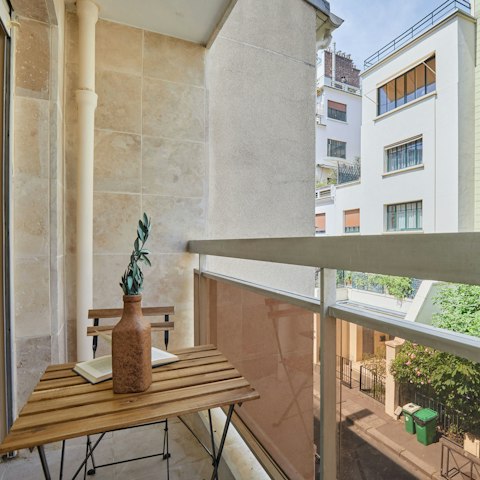 Enjoy a cup of coffee or glass of wine on the small balcony