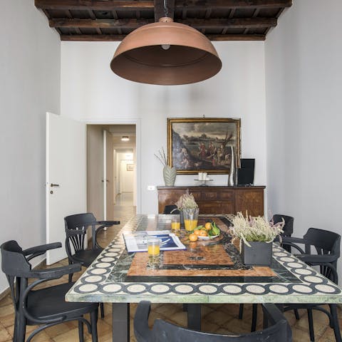 Enjoy a pizza at the ornate table