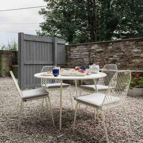 Enjoy an alfresco cream tea in the charming courtyard