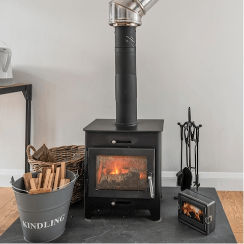 Cosy up by the wood-burning stove