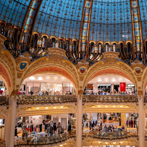 Shop 'til you drop at the historic Galeries Lafayette nearby