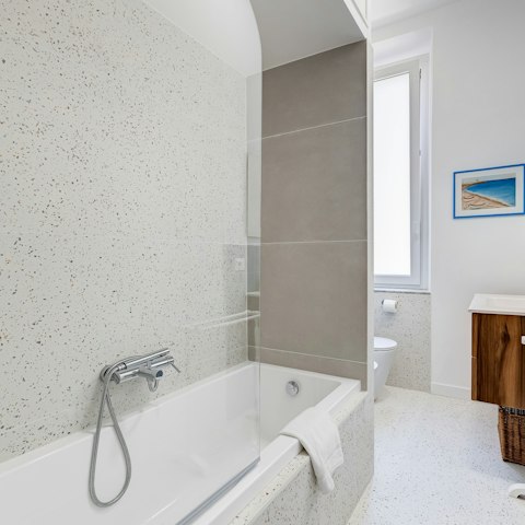 Soak in the tub after a day exploring the Eternal City