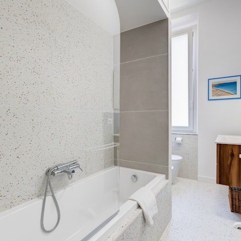 Soak in the tub after a day exploring the Eternal City