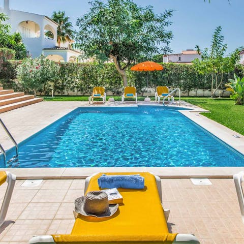 Spend an afternoon drifting in and out of sleep with a cocktail by the pool