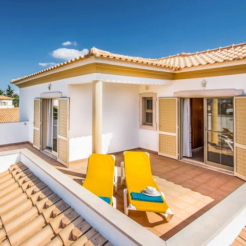 Soak up the sun with a Portuguese beer on the rooftop