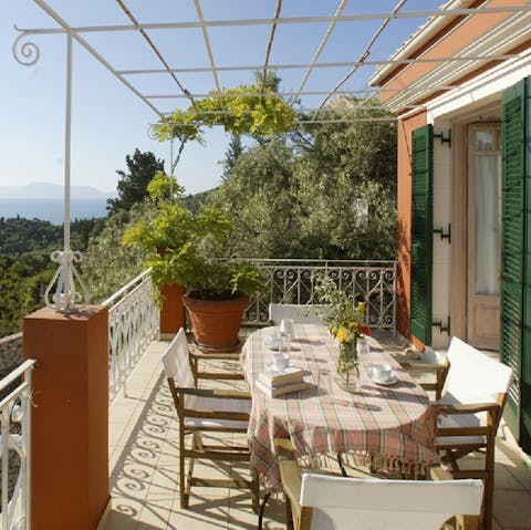 Enjoy a refreshing Greek salad and perhaps a glass of chilled ouzo on your balcony