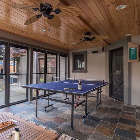 Challenge family or friends to a game of ping-pong or foosball in the well stocked games room