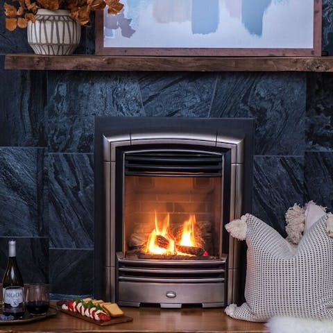 Snuggle up next to the modern fireplace with an Irish coffee or hot coco