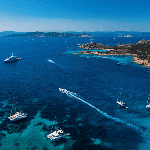 Watch the day pass by from the soft sands of Li Cossi Beach 