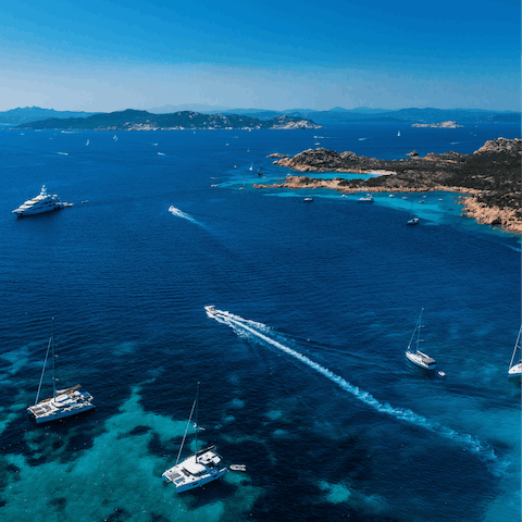 Watch the day pass by from the soft sands of Li Cossi Beach