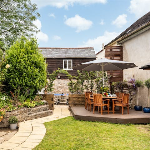 Claim the hotly contested table tennis championship before an alfresco dinner on the deck