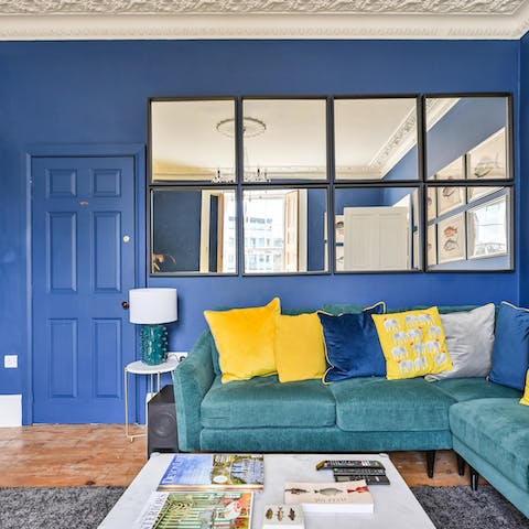 Lay claim to a prime spot on the sofa in either of the two living rooms
