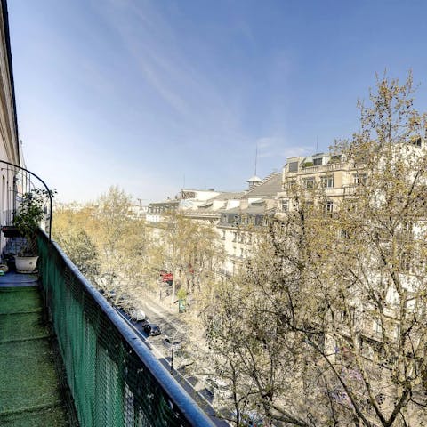 Watch the world go by from your top-floor balcony