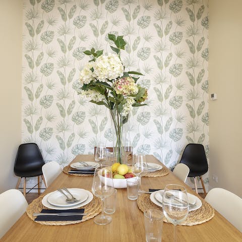 Enjoy a home-cooked meal at the wooden dining table