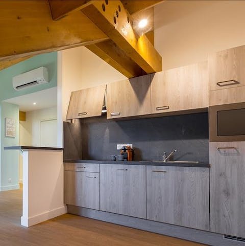 Prepare a delicious homecooked meal in the sociable kitchen
