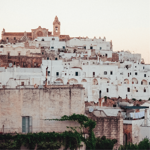 Drive ten minutes to Ostuni, the White City