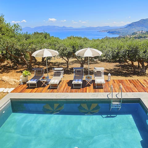 Bag a lounger by the poolside and dry off in the Sicilian sun