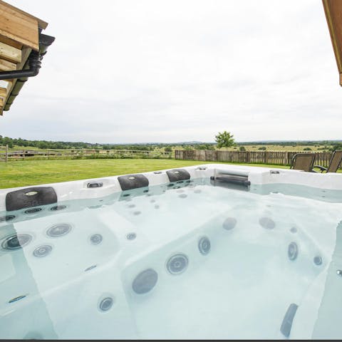 Relax in the hot tub with views across the Somerset countryside