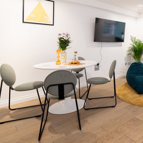Start your mornings with a hearty breakfast at the modern dining table