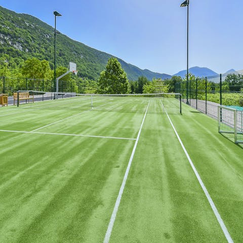 Embrace an energising game of tennis on the nearby courts