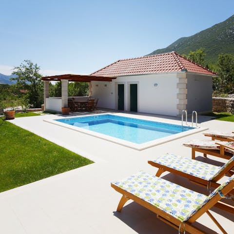 Find peace and privacy while lounging by the pool