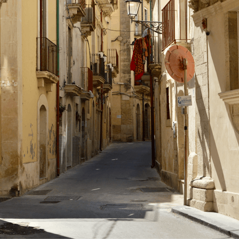 Embark on a forty-three minute train ride to the historical town of Catania
