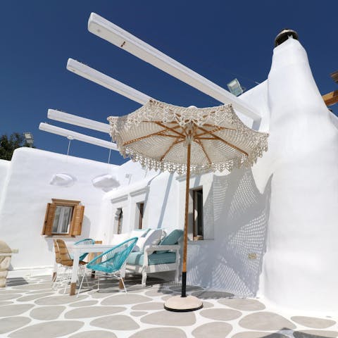 Choose a spot shaded by a pergola or macrame parasol