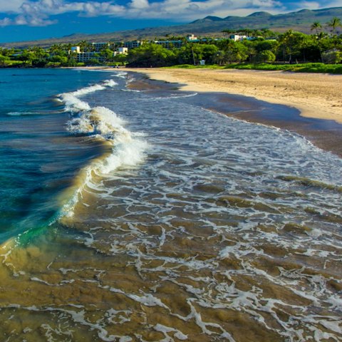 Swim at Hapuna Beach, one of Hawaii's most celebrated white-sand shores