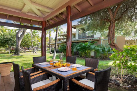 Begin the day with breakfast on the covered lanai beneath the palms