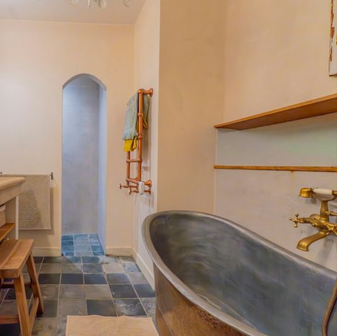 Soak in the freestanding bathtub after exploring Paris