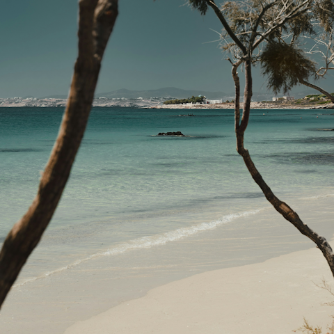 Discover blissful beaches around the coast of Paros