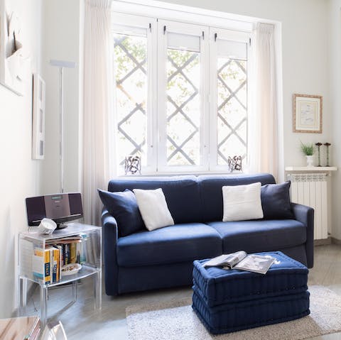 Unwind from the day's adventures in the light-filled living area, playing your favourite tunes on the speaker