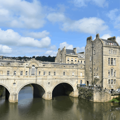 Head five minutes down the road and cross the picturesque Pulteney Bridge