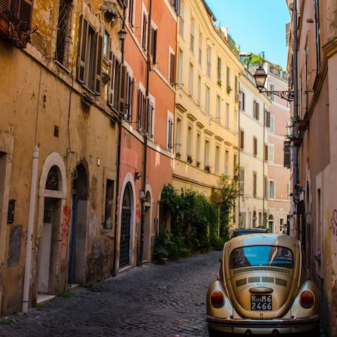 Lose yourself in the charming maze-like streets of Trastevere – this hipster haunt is a five-minute walk from your apartment