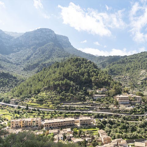 Stay in Deia surrounded by verdant mountains and honey-hued towns