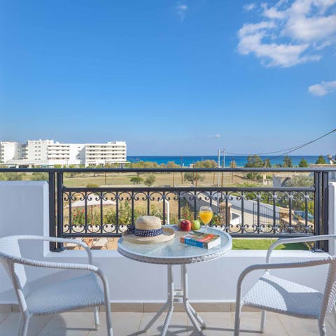Sip coffee while drinking in sea views from the balcony