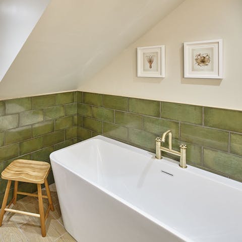 End the day with a soak in the deep bathtub