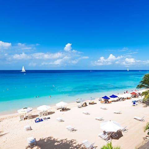 Enjoy uninterrupted views of beautiful Paynes Bay from your first-floor terrace