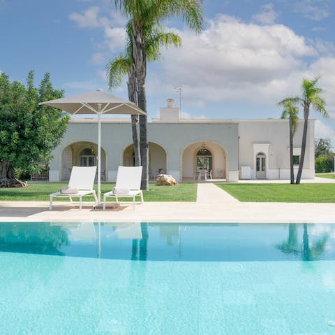 Swim laps of the pool or lounge poolside on the sun-drenched patio