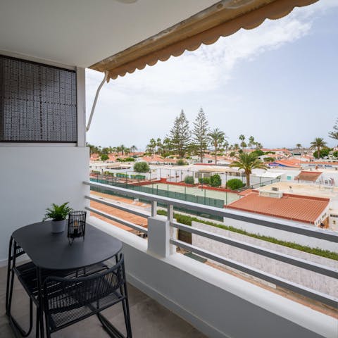 Relax and unwind with drinks on the balcony