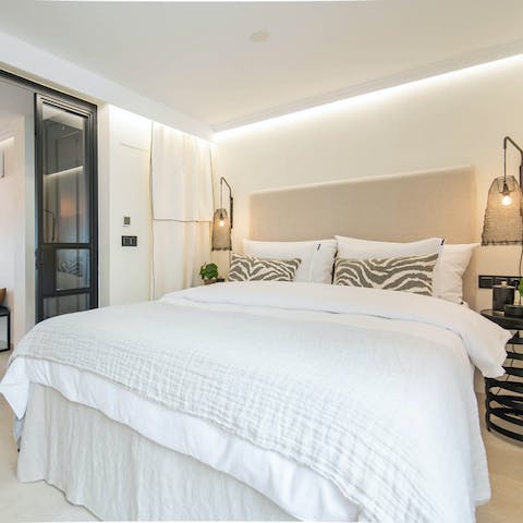 Retire to your master bedroom to unwind after a fun day of sun, surf, and sand