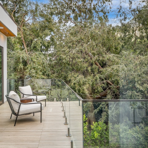 Sip a pinot noir out on the bedroom's private balcony