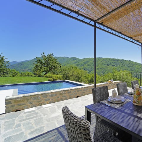 Pause from your swim session to dine by these views