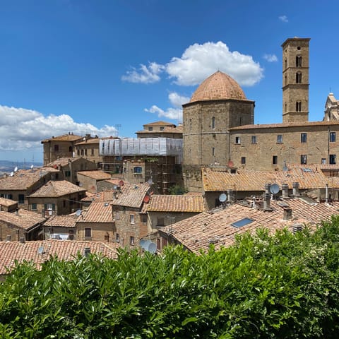 Head into the ancient walled city of Volterra, a twenty-minute drive away
