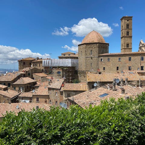 Head into the ancient walled city of Volterra, a twenty-minute drive away